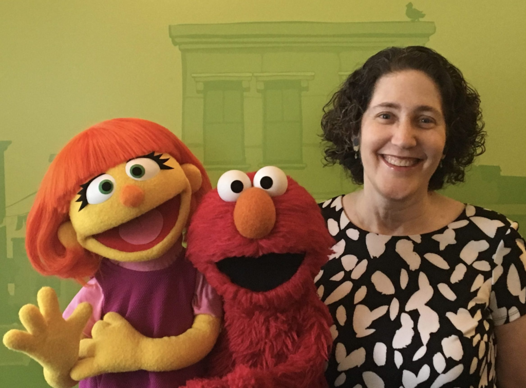 Leslie Kimmelman with friends from Sesame Street, Elmo and Julia